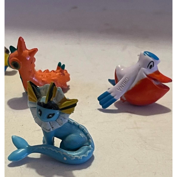 R/L W 2005-07 Allakazam Gardevoir Wurmple Pelipper Hariyama Vaporeon Pokemon 1" - Picture 2 of 4